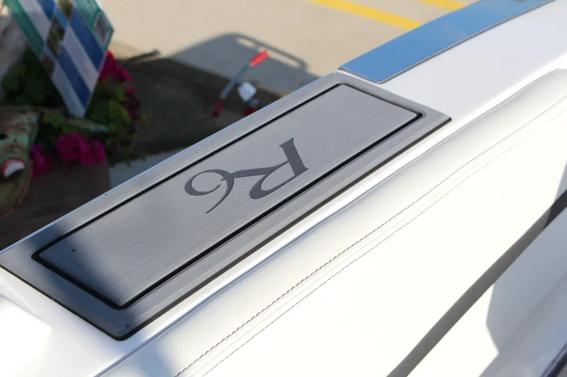 Slide: The Image of 2026 Cobalt R6 boat detail with sleek design and logo. - 44