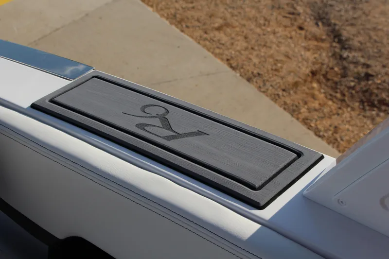 Slide: The Image of 2026 Cobalt R6 boat detail with sleek black panel design. - 45