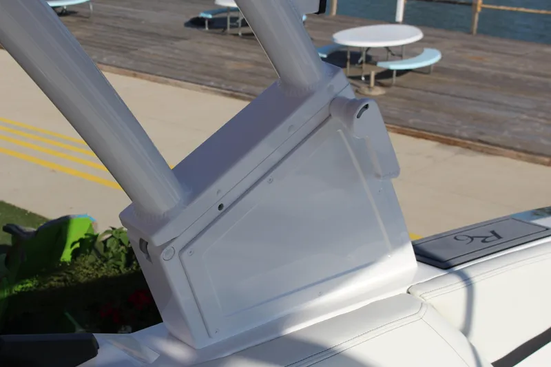 Slide: The Image of 2026 Cobalt R6 boat detail with sleek white design near waterfront. - 50