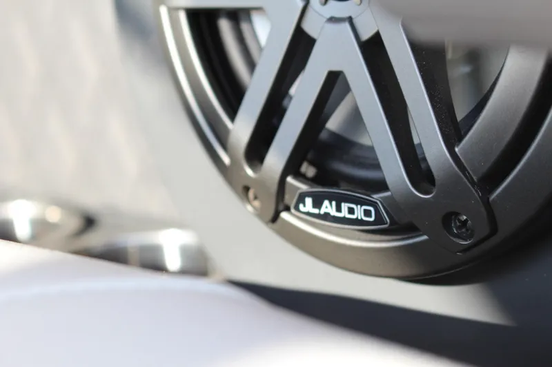 Slide: The Image of Close-up of JL Audio speaker in 2026 Cobalt R6 boat interior. - 55
