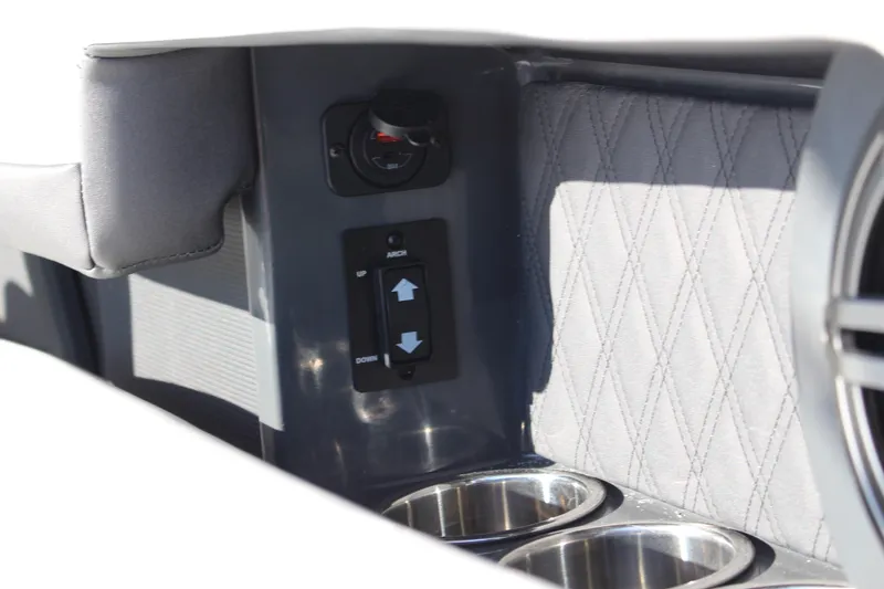 Slide: The Image of Interior of 2026 Cobalt R6 featuring control panel and cup holders. - 56