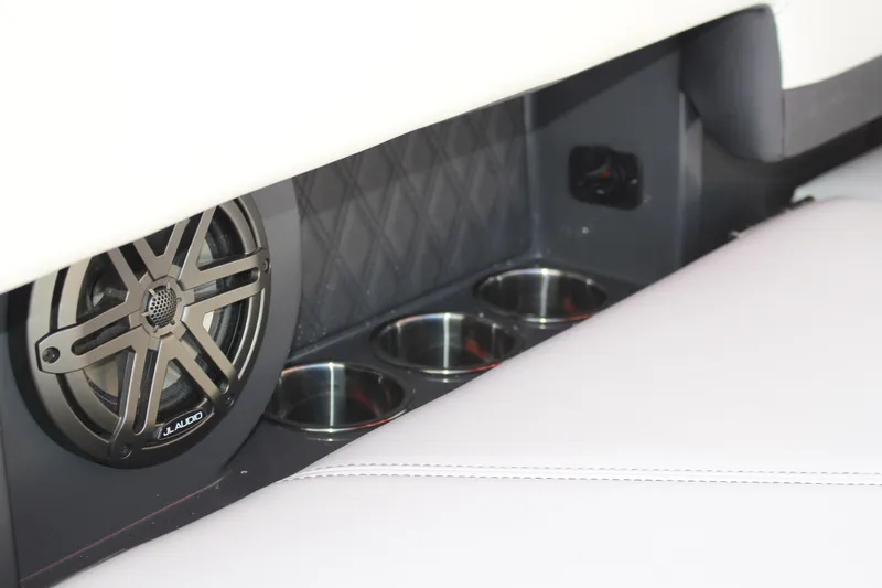 Slide: The Image of 2026 Cobalt R6 interior with JL Audio speaker and cup holders. - 57