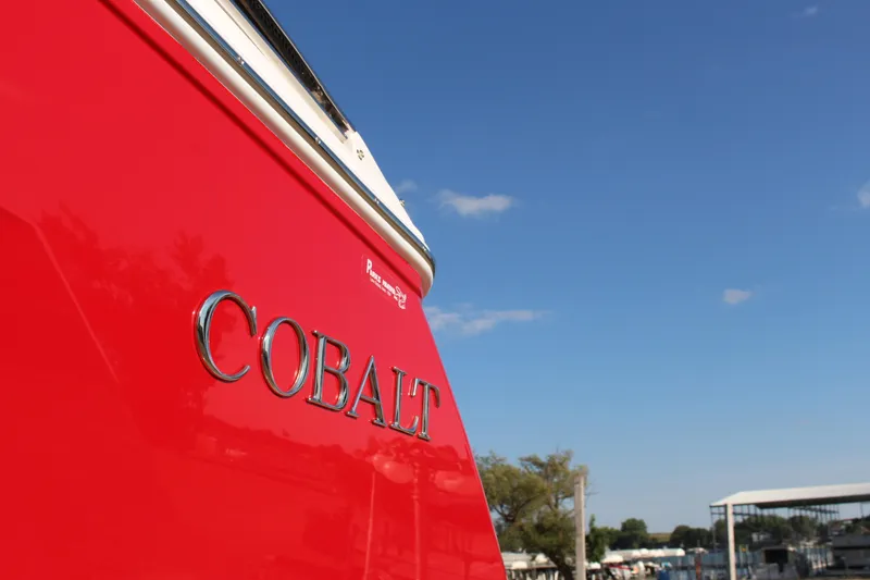 Slide: The Image of Red 2026 Cobalt R6 boat with clear blue sky background. - 66