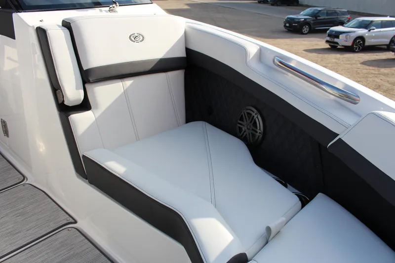 Slide: The Image of Luxurious seating on 2026 Cobalt R6 boat with sleek white and black design. - 7