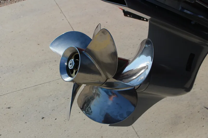 Slide: The Image of 2026 Cobalt R6 boat propeller, shiny stainless steel, close-up view. - 78