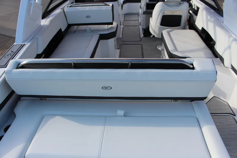 Slide: The Image of 2026 Cobalt R6 boat interior with luxurious white seating and modern design. - 85