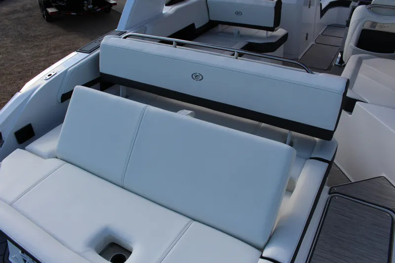 Slide: The Image of 2026 Cobalt R6 boat interior with luxurious white seating and modern design. - 86