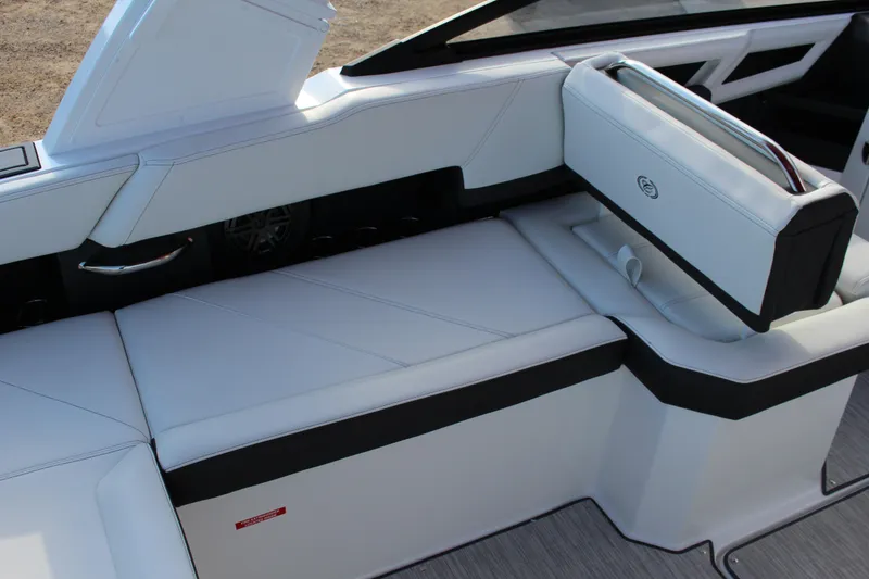 Slide: The Image of 2026 Cobalt R6 boat interior with sleek white seating and modern design. - 89