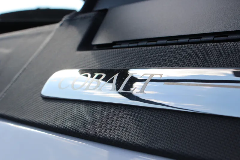 Slide: The Image of 2026 Cobalt R6 logo on sleek black surface. - 94