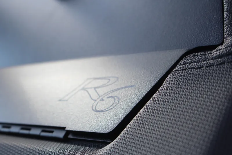 Slide: The Image of Close-up of 2026 Cobalt R6 logo on textured surface. - 95