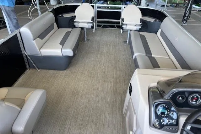 Slide: The Image of 2022 Princecraft Sportfisher 23-2S RL interior with spacious seating and modern dashboard. - 11