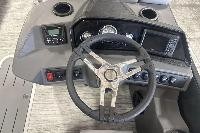 Slide: The Image of Steering console of 2026 Bennington 22 SSR boat with modern controls and gauges. - 8