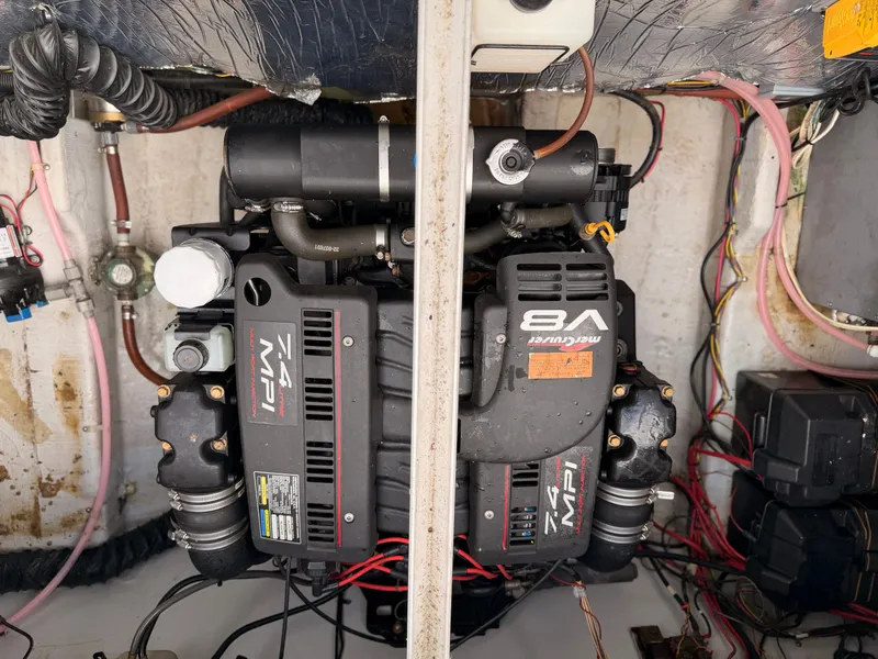 Slide: The Image of Engine compartment of a 1998 Carver Express Special Edition with MerCruiser V8 engines. - 20