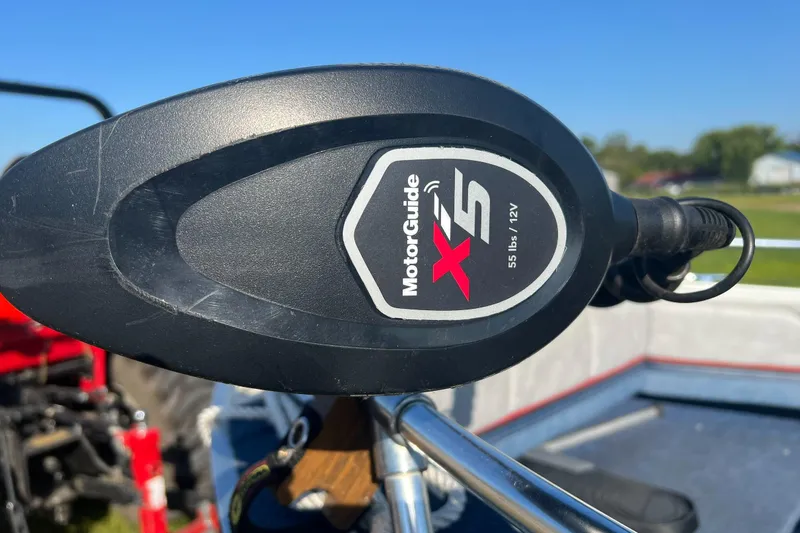 Slide: The Image of MotorGuide X5 trolling motor on 1987 Blue Fin Sportsman boat, sunny day background. - 5