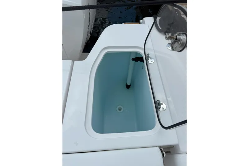 Slide: The Image of Livewell compartment on 2026 Southport 30 FE boat, featuring a sleek design. - 9