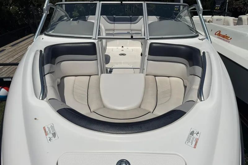 Slide: The Image of 2006 Yamaha Boats AR230 HO with spacious seating and sleek design. - 5