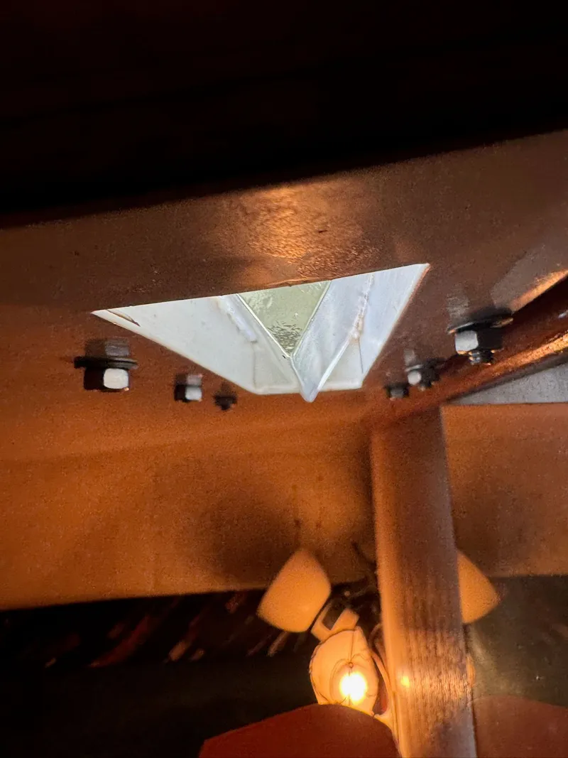 Slide: The Image of Interior view of a 1963 Hatteras Sport Fisherman boat with lighting fixtures. - 20