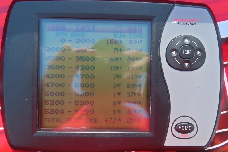 Slide: The Image of Mercury SmartCraft display showing RPM and run time for 2004 Outerlimits 42 Legacy. - 11