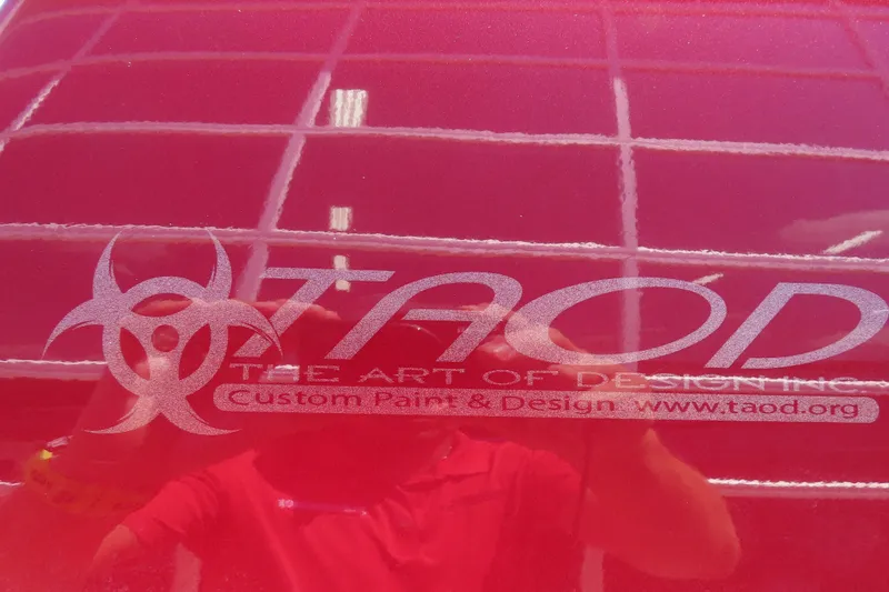 Slide: The Image of Red Outerlimits 42 Legacy 2004 with TAOD custom paint design logo. - 21