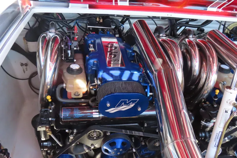 Slide: The Image of Engine of 2004 Outerlimits 42 Legacy boat with polished chrome components. - 4