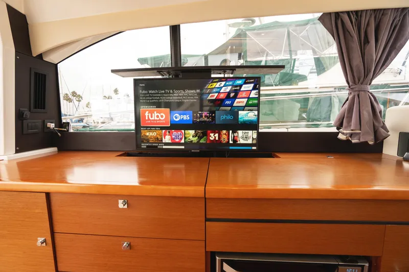 Slide: The Image of Interior of 2014 Jeanneau NC 14 yacht with modern entertainment system. - 16