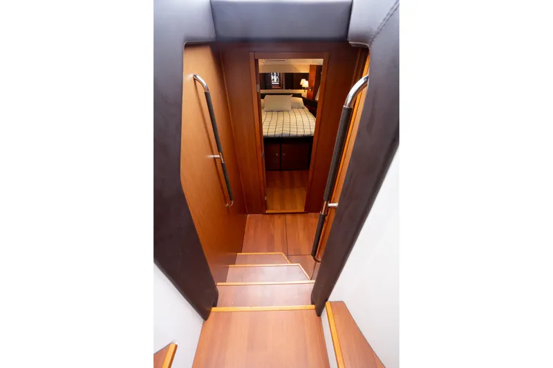 Slide: The Image of Stairway leading to cabin interior of 2014 Jeanneau NC 14 yacht. - 30