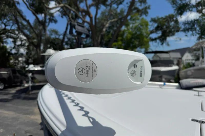 Slide: The Image of 2023 Sportsman Tournament 214 SBX Bay Boat with i-Pilot Link system, outdoor setting. - 15