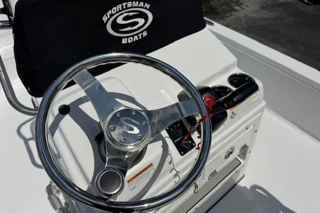 Slide: The Image of 2023 Sportsman Tournament 214 SBX Bay Boat steering wheel and console detail. - 21