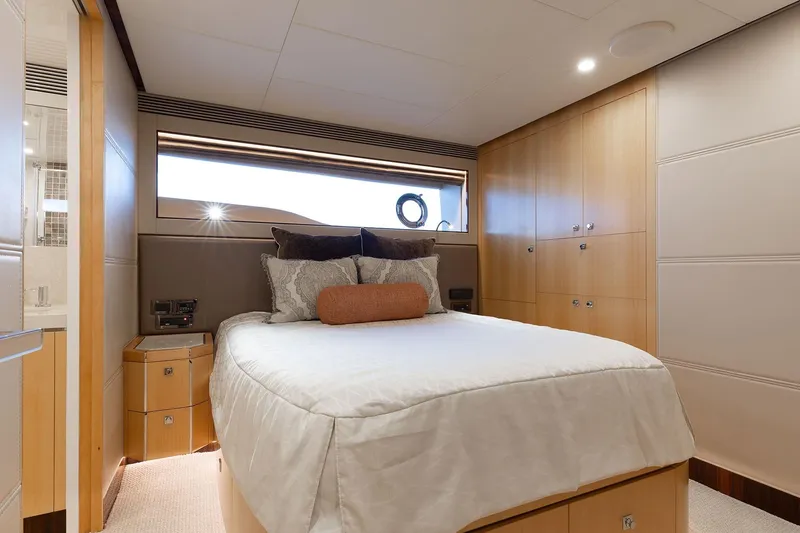 Slide: The Image of Luxurious bedroom interior on 2021 Horizon yacht, featuring modern design and cozy bedding. - 13