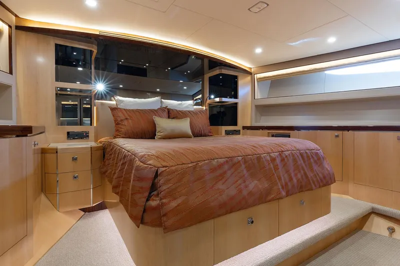 Slide: The Image of Luxurious yacht bedroom interior with elegant bedding, warm lighting, and modern design, Horizon 2021 model. - 15