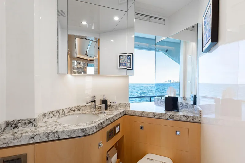 Slide: The Image of Luxurious yacht bathroom with marble countertop, ocean view, and modern fixtures, Horizon 2021 model. - 5