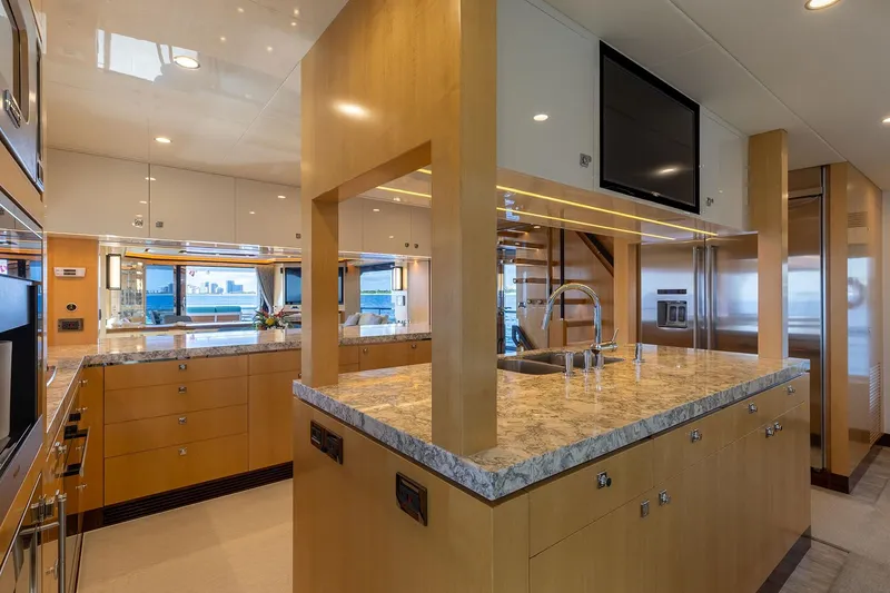 Slide: The Image of Luxurious yacht kitchen interior with modern appliances, marble countertops, and panoramic windows. Horizon 2021 model. - 7