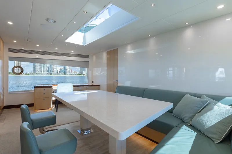 Slide: The Image of Luxurious yacht interior with skylight, modern seating, and waterfront view. Horizon 2021 model. - 8