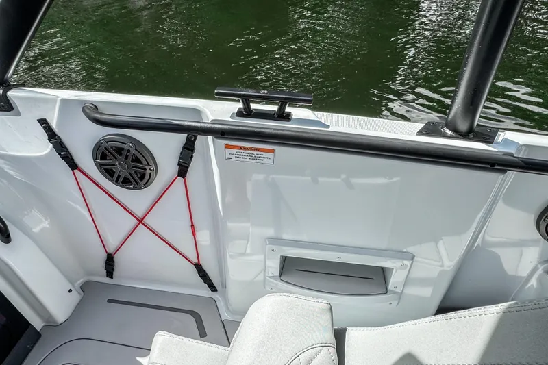 Slide: The Image of 2023 BRABUS Shadow 300 XT boat interior with speaker and red bungee cords. - 11