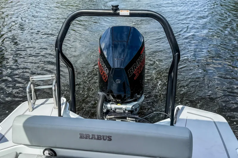 Slide: The Image of 2023 BRABUS Shadow 300 XT boat engine on water, rear view. - 8