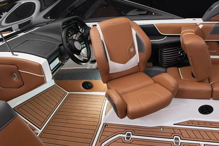 Slide: The Image of Manufacturer Provided Image: 2016 Nautique Super Air G23 interior with brown leather seats and wood flooring. - 17