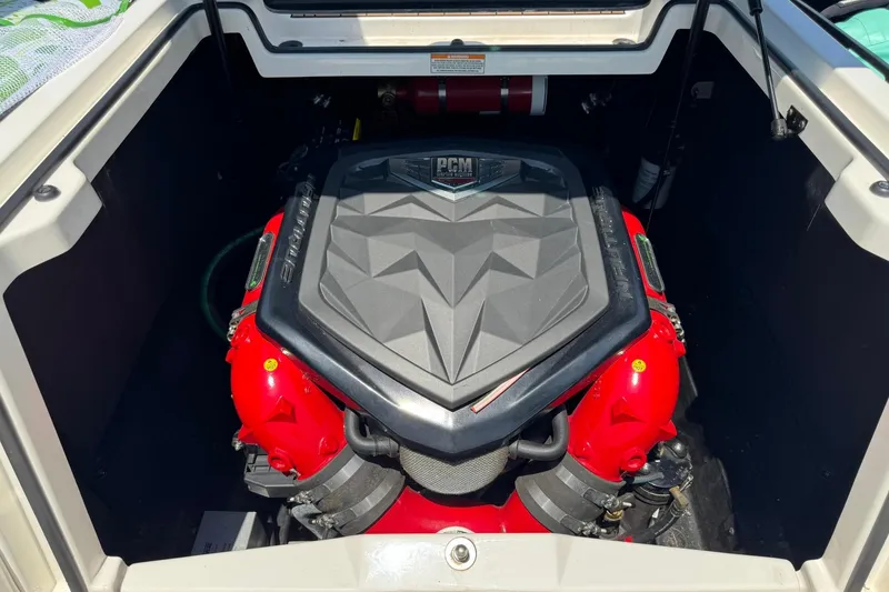 Slide: The Image of Engine compartment of 2017 Nautique Super Air Nautique G23 boat, featuring PCM engine. - 8