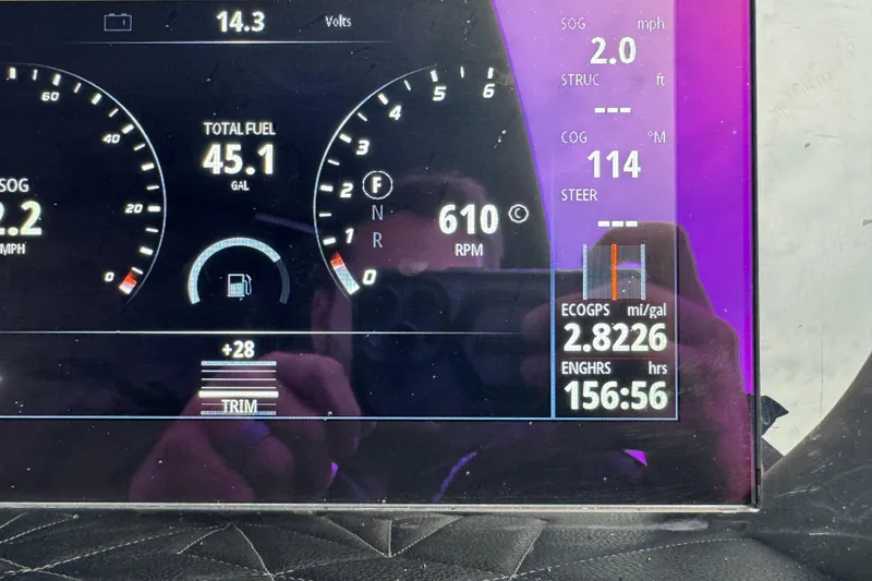 Slide: The Image of Dashboard of 2023 Harris Grand Mariner 250 showing fuel, RPM, and engine hours. - 21