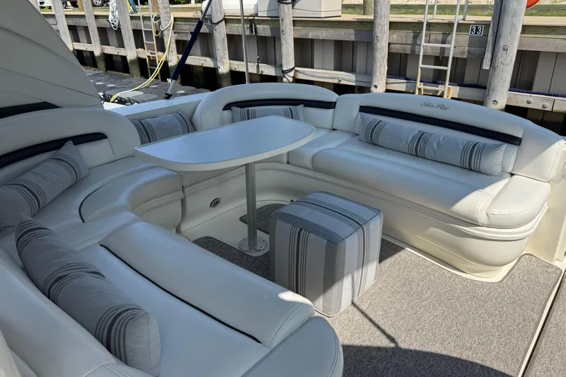 Slide: The Image of Luxurious seating area on a 2003 Sea Ray 420 Sundancer yacht. - 11
