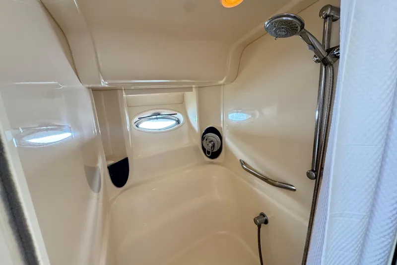 Slide: The Image of Shower area in 2003 Sea Ray 420 Sundancer yacht with modern fixtures. - 33