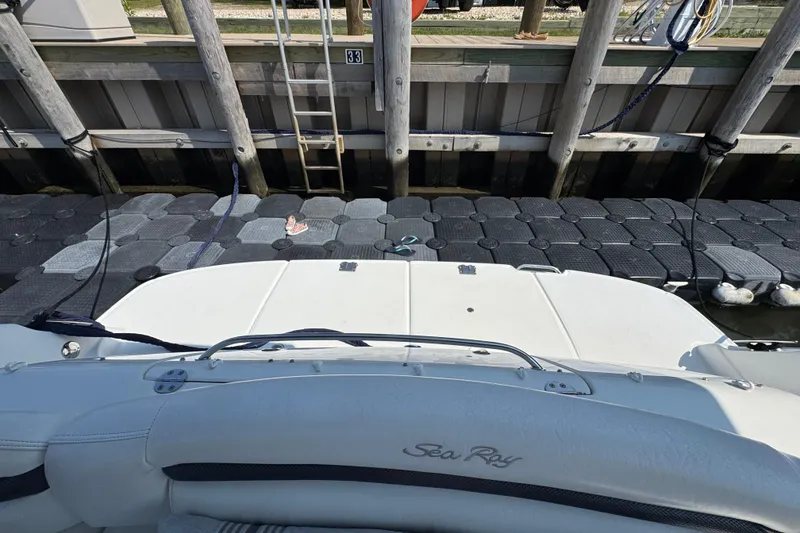 Slide: The Image of 2003 Sea Ray 420 Sundancer docked at marina with floating platform. - 6