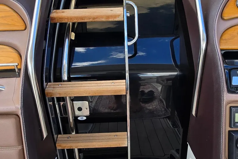 Slide: The Image of Stainless steel and wood ladder on 2011 Cobalt 323 boat interior. - 12