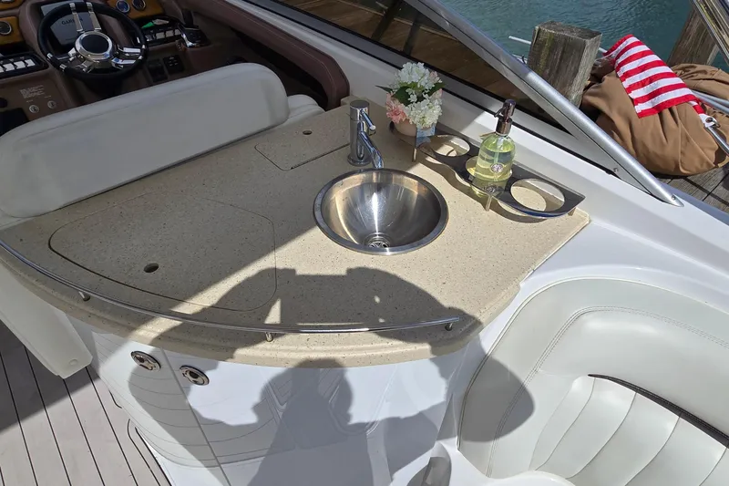 Slide: The Image of Luxury boat interior with sink and countertop on a 2011 Cobalt 323. - 29