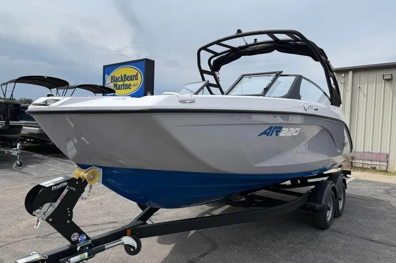 Slide: The Image of 2026 Yamaha Boats AR220 on trailer at BlackBeard Marine dealership. - 3