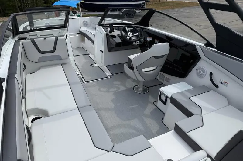 Slide: The Image of 2026 Yamaha Boats AR220 interior with modern seating and sleek design. - 7