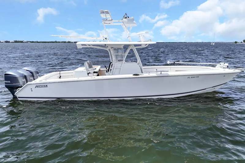 Slide: The Image of 2017 Jupiter 34 FS boat on water with twin Yamaha engines. - 5