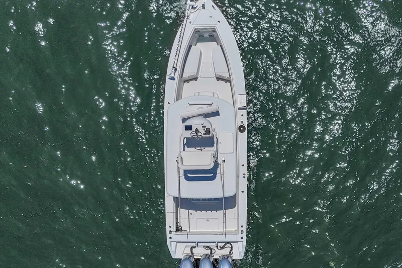Slide: The Image of Overhead view of 2017 Jupiter 34 FS boat on sparkling water. - 6