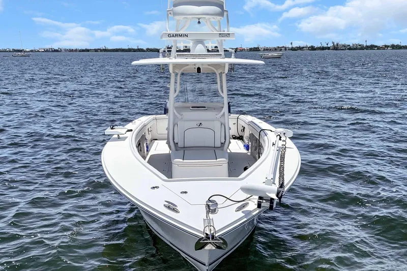 Slide: The Image of 2017 Jupiter 34 FS boat on water, front view, clear sky background. - 8