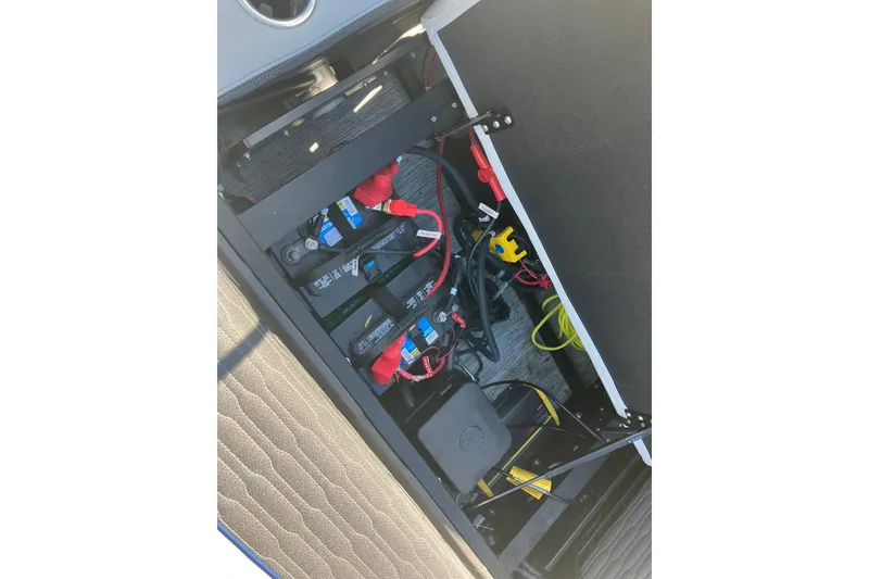 Slide: The Image of 2023 Barletta CORSA 25UE battery compartment with wiring and components. - 17