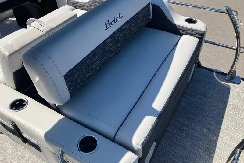 Slide: The Image of 2023 Barletta CORSA 25UE boat seat with cup holders and sleek design. - 18